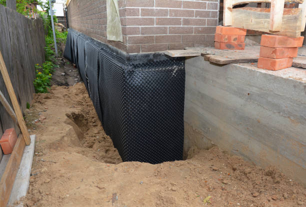 Happy homeowners after waterproofing job in Ringwood
